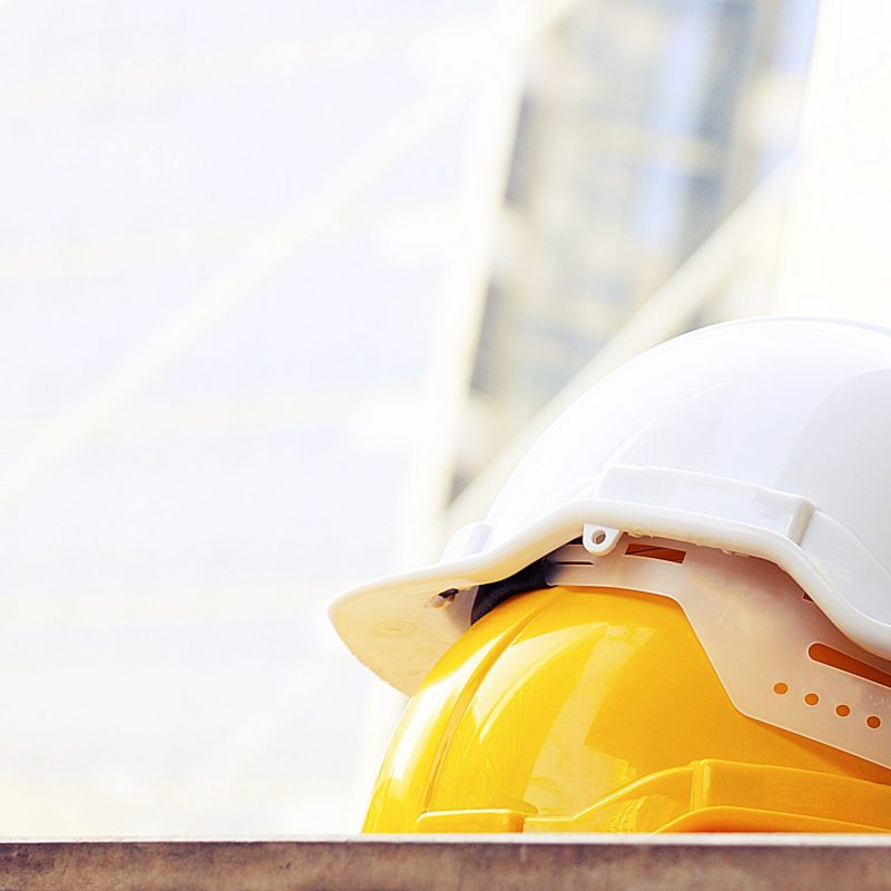 safety-hats-are-in-the-floor-on-building-backgroun-2021-09-03-17-56-59-utc